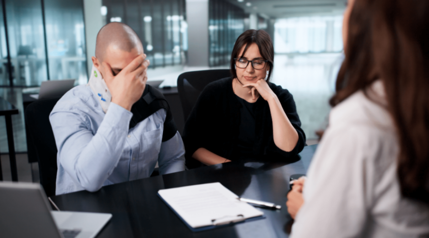 Injury Attorney discussing case with client