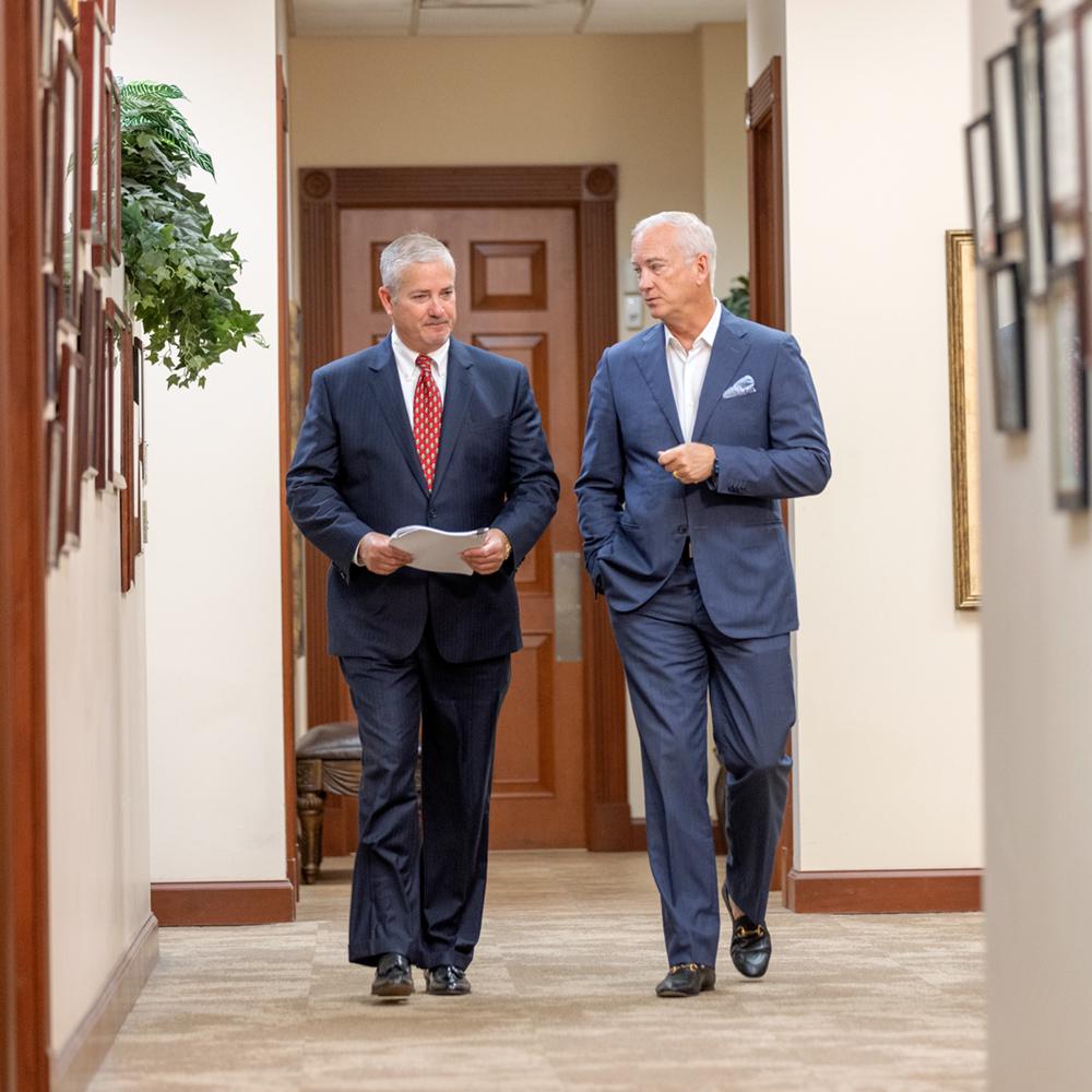 mark-lance-walking Mark and Lance walking down a hallway